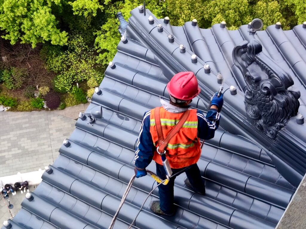 Man Working on Rooftop